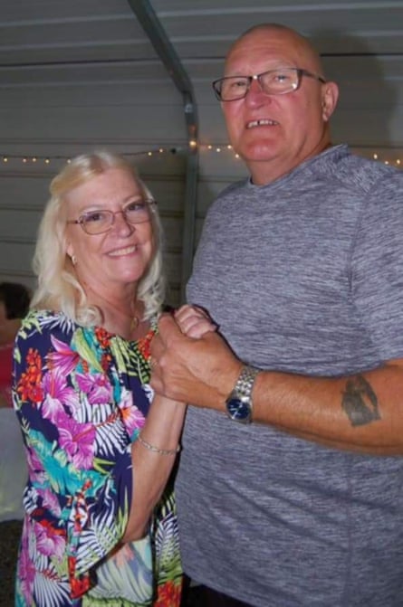 a men and women holding hands