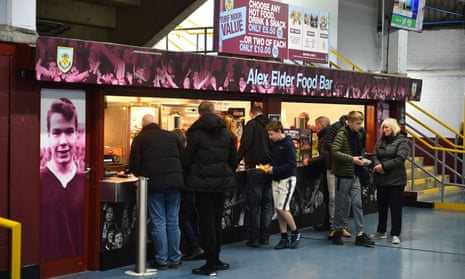 Fans buying food at Burnley's Turf Moor stadium.