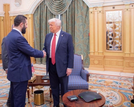 Donald Trump shaking hands with Syrian president Ahmed al-Sharaa in Riyadh, Saudi Arabia, earlier today.