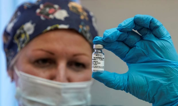 A nurse holds Russia’s Sputnik-V coronavirus vaccine prepared in post-registration trials at a clinic in Moscow, September 2020. 