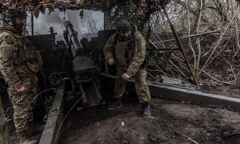 Ukrainian soldiers fire on Avdiivka after Russian forces finally claim control of the city in Donetsk region