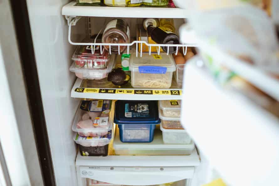A fridge with a designated Use It Up shelf, marked by tape OzHarvest is making available free of charge in Australia.