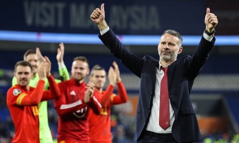 Wales’s manager Ryan Giggs thanks the fans after his side had qualified for Euro 2020. 