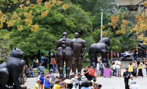 People amongst statues at Botero Square