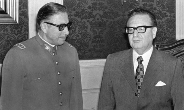 Augusto Pinochet (left) poses Allende in August 1973