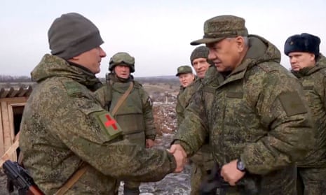 Russian defence minister Sergei Shoigu meets Russian military personnel involved in the war at an unknown location in Ukraine, in an image released last week