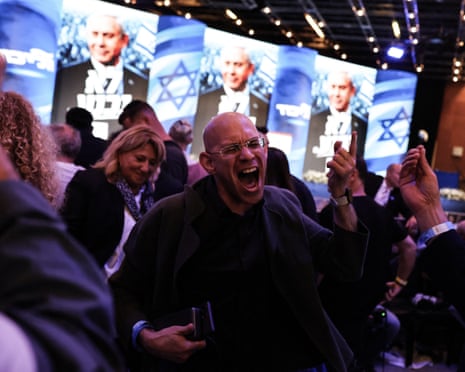 A supporter of Benjamin Netanyahu shows his excitement on election night in Jerusalem
