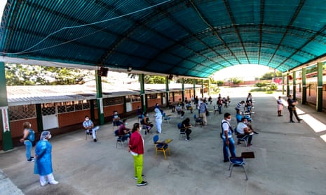 Venezuelans wait in line to get a Covid-19 test at a testing center in Cucuta, on the Colombian border with Venezuela. Colombia has been one of the worst hit countries in Latin America by the pandemic with more than 1.5 million cases and over 40,000 deaths.