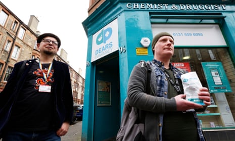 Rab Dylan (right) and Lucas Waclawski collect a methadone prescription from a pharmacy in Edinburgh
