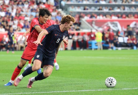 South Korea defender Kim Min-Jae (4) and USMNT forward Josh Sargent (9) battle for the ball at Sports Illustrated Stadium.