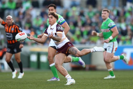 Reece Walsh of the Broncos passes the ball during the NRL Qualifying Final match between Canberra Raiders and Brisbane Broncos