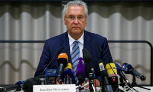 Bavarian interior minister Joachim Herrmann addresses the news conference in Ansbach.