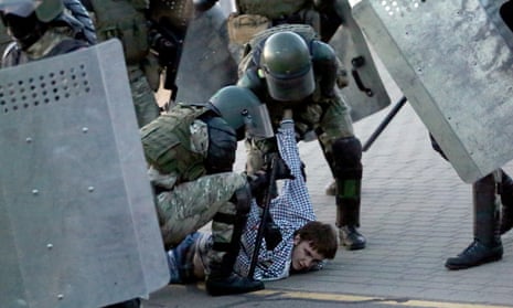Law enforcement officers detain a man during an opposition rally to protest against the presidential inauguration in Minsk, Belarus.