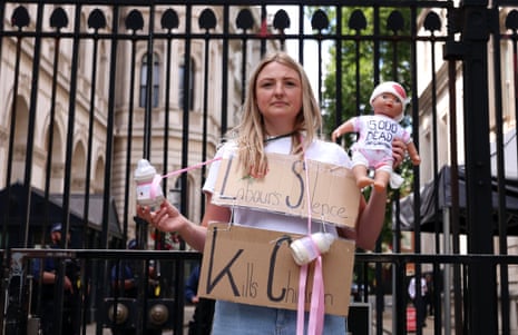 A campaigner outside Downing Street today protesting on behalf of children in Gaza.