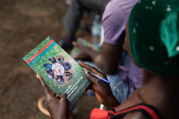 Potential PrEP trial volunteers receive information at a community outreach session, Bukakata, Uganda.