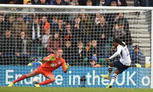 Daniel Johnson slots the ball home from the spot to get the home side back on level terms.