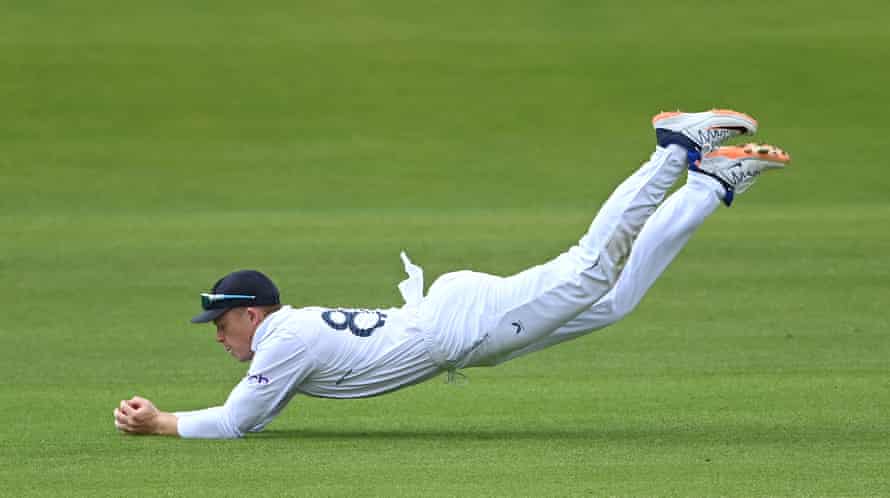 Ollie Pope dives to dismiss Trent Boult. That’s New Zealand all-out for 132.