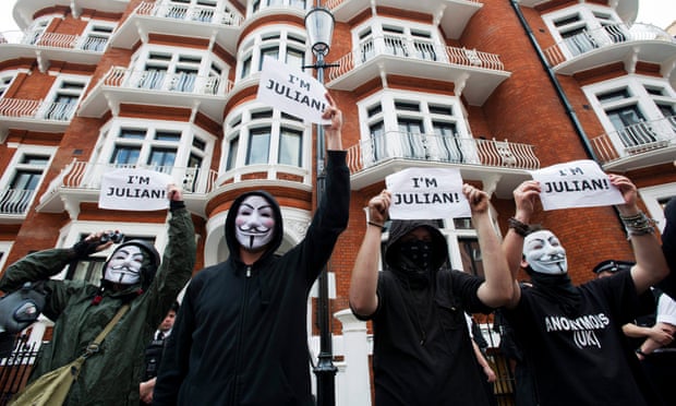 Demonstrators in Guy Fawkes masks outside the Ecuadorian embassy in Knightsbridge in August 2012