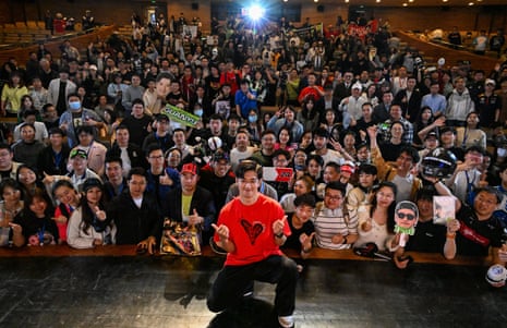 Zhou Guanyu poses for a pictures with fans after the world premiere of the The First One in Shanghai this week