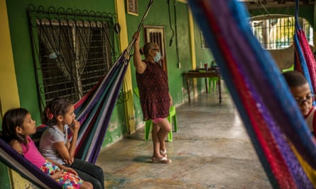 Alba Hernández, centre, like all her neighbours in Chapagua, was forced to leave her home due to the flood caused by the Eta and Iota storms in late 2020.