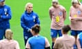 Sarina Wiegman talks to her players during training in Gothenburg