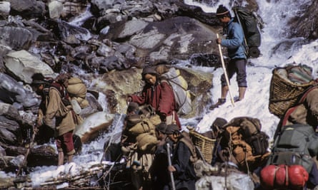 Matthiessen’s team crosses a mountain stream during the trek.