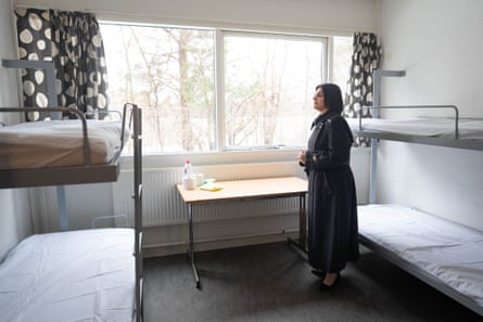 Shabana Mahmood next to a window in a room with bunk beds