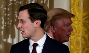 Donald Trump passes Jared Kushner at the White House in 2017.