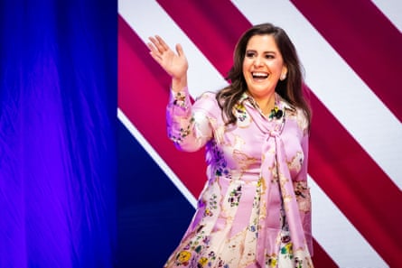 Elise Stefanik walks on stage at CPAC on 23 February.