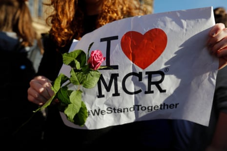 Candlelit Vigil To Honour The Victims Of Manchester Terror Attack(170523) -- MANCHESTER, May 23, 2017 (Xinhua) -- A young girl holds up a sign and a flower during a candlelit vigil to honour the victims of Monday evening’s terror attack, at Albert Square in Manchester, Britain on May 23, 2017. (Xinhua/Han Yan) PHOTOGRAPH BY Xinhua / Barcroft Images London-T:+44 207 033 1031 E:hello@barcroftmedia.com - New York-T:+1 212 796 2458 E:hello@barcroftusa.com - New Delhi-T:+91 11 4053 2429 E:hello@barcroftindia.com www.barcroftimages.com