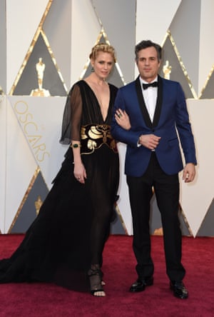 Actor Mark Ruffalo and his wife Sunrise Coigney. Ruffalo’s gone red carpet edgy with his blue tux with with black trimming. The less said about his lovely wife’s wrestling medal belt the better though. So we’re not saying anything.