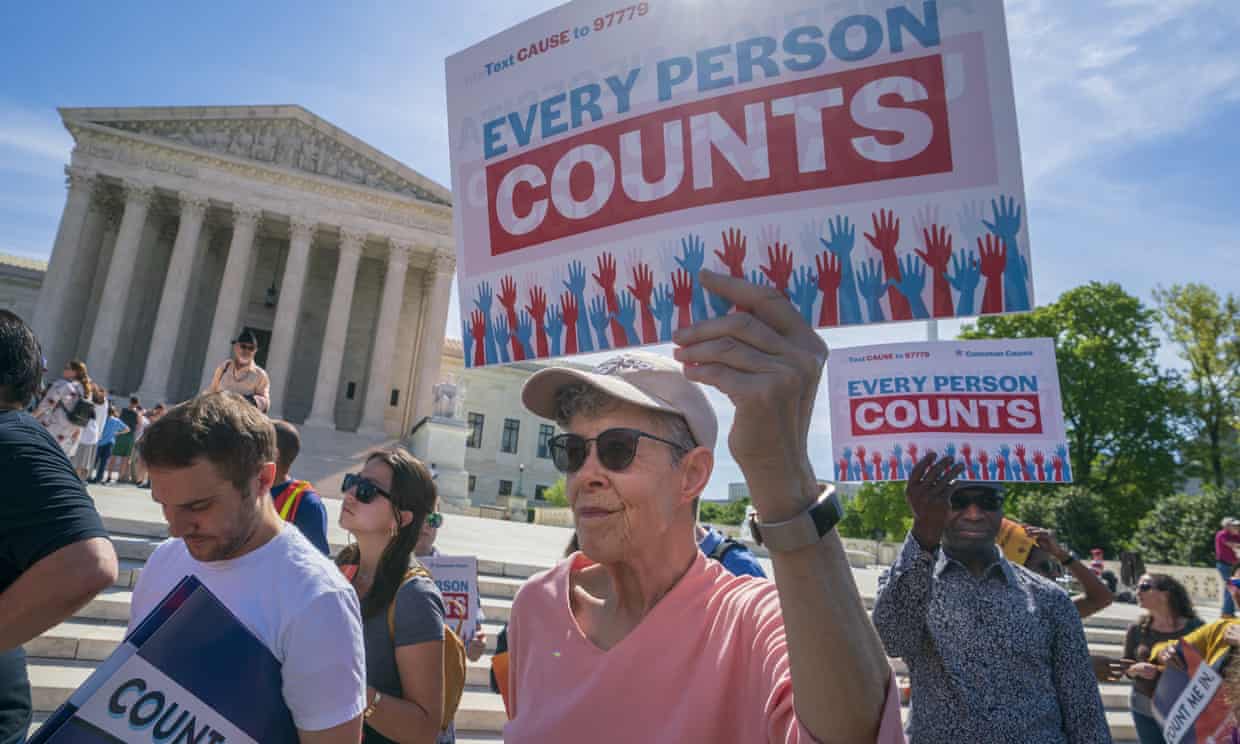 Immigration activists rally outside the supreme court as the justices hear arguments over the Trump administration’s plan to ask about citizenship on the 2020 census, on Tuesday.