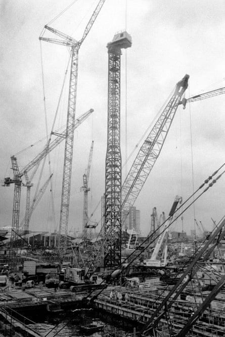 Cranes loom over the area in 1990, at the start of the project. Some residents can barely remember a time when they weren’t there.