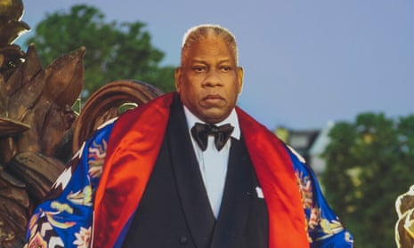 André Leon Talley in black tie and magnificent robe on a bridge in Paris at dusk