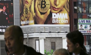 A bitcon billboard near a train station in Tokyo.