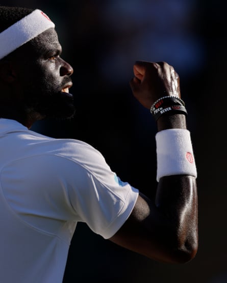 Francis Tiafoe clenches his fist after victory