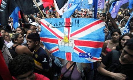 Argentinian activists hold a poster reading ‘We will be back!’ during a demonstration in 2012 over the disputed Falklands/Malvinas islands.