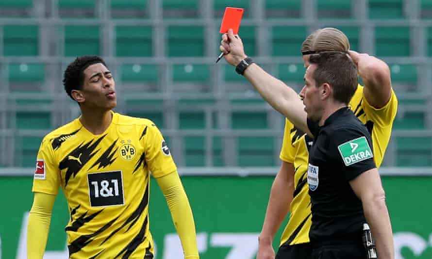 Referee Tobias Stieler shows Jude Bellingham the red card – the England international’s first dismissal as a professional.