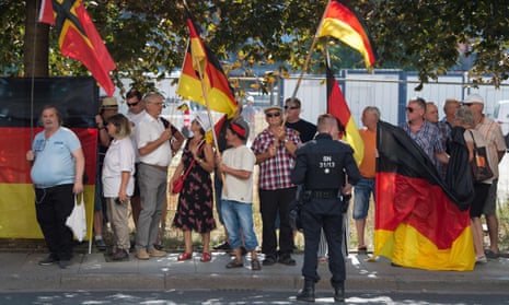 Pegida supporters protest against Angela Merkel’s visit to Dresden, Saxony.