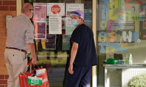 Medical personnel are seen outside the Florence aged care facility amid the second wave of the coronavirus in Melbourne.