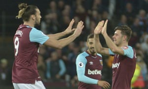 Andy Carroll and some smaller people.