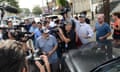 The father of Ahmed Rahami, Mohammad Rahami, center left, comes out from his home, through a crowd of media to get to his vehicle, Tuesday, Sept. 20, 2016 in Elizabeth, N.J . Mohammad Rahami contacted the FBI two years ago with concerns his son was a terrorist, a law enforcement official said Tuesday. But the father later retracted the claim.  (Tariq Zehawi/Northjersey.com via AP)