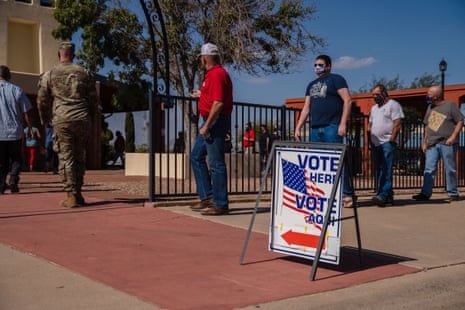 Voters wait in line at a polling station in Sierra Vista, Arizona, on 3 November 2020.