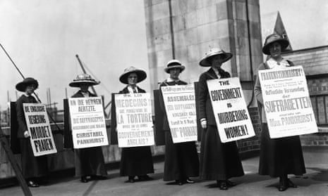 Suffragettes demonstrate with sandwich boards