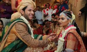 The daughter of Gali Janardhan Reddy, Bramhani, with her groom, Rajeev Reddy, during their wedding at the Bangalore Palace Grounds in Bangalore