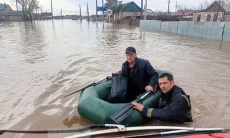 Russia floods: waters rising in two cities and thousands evacuated after dam bursts