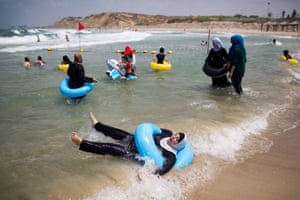 Palestinians from the West Bank city of Hebron enjoy the beach in Tel Aviv for the first time