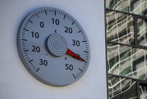 A thermometer mounted connected  a partition  of the office  of the United Nations Framework Convention connected  Climate Change successful  Bonn, Germany