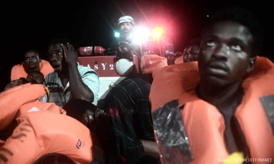 People being rescued before boarding the French NGO’s ship Aquarius.