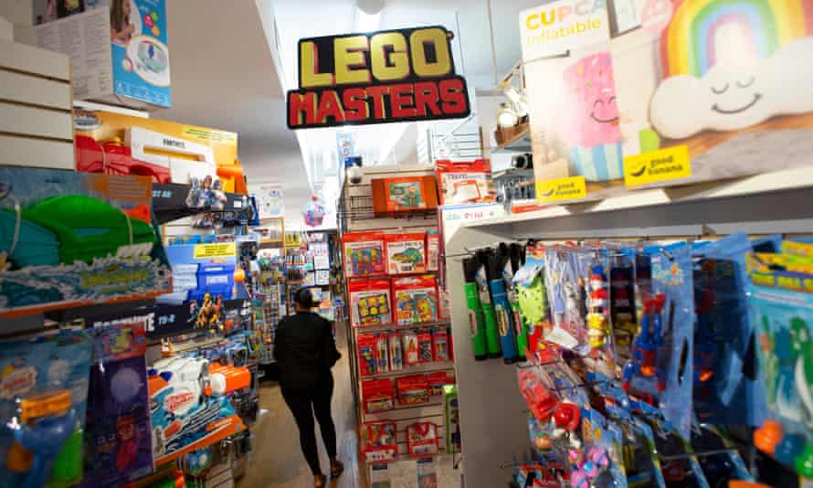 An employee walks through the aisles of Mary Arnold Toys, New York city oldest toy store